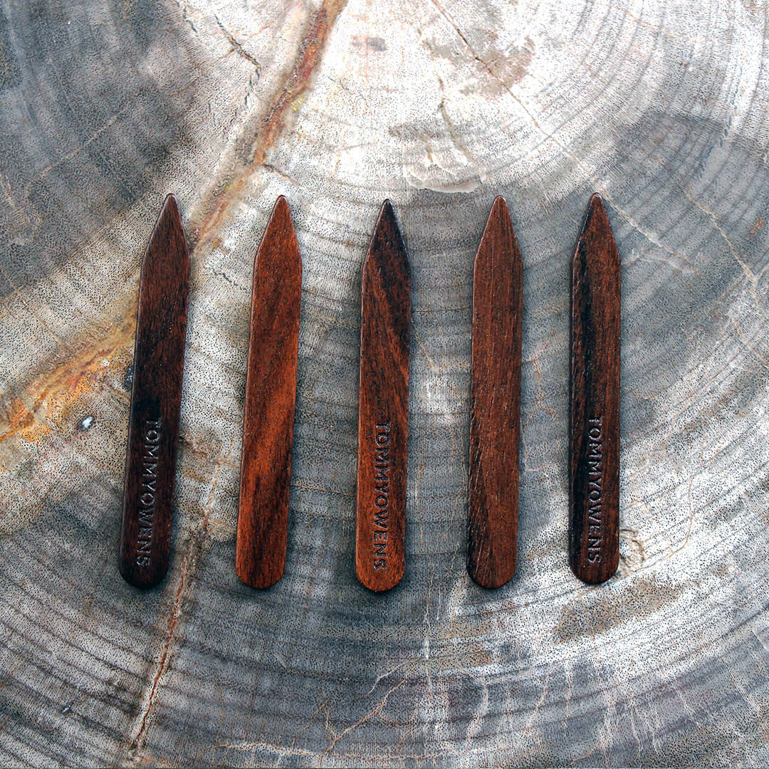 Handcrafted rosewood collar stays with a deep, reddish-brown hue and subtle grain. Eco-friendly and stylish.